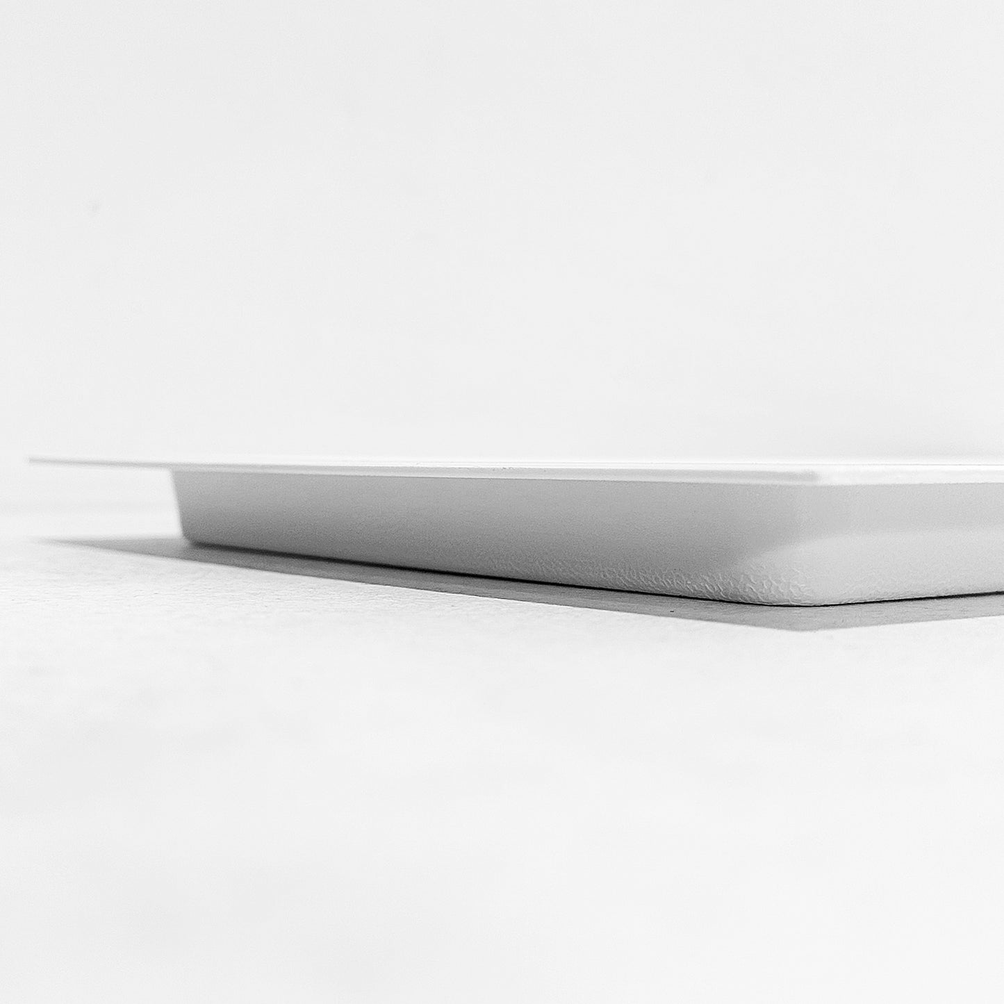 Side view of outward mounted vent cover (white)