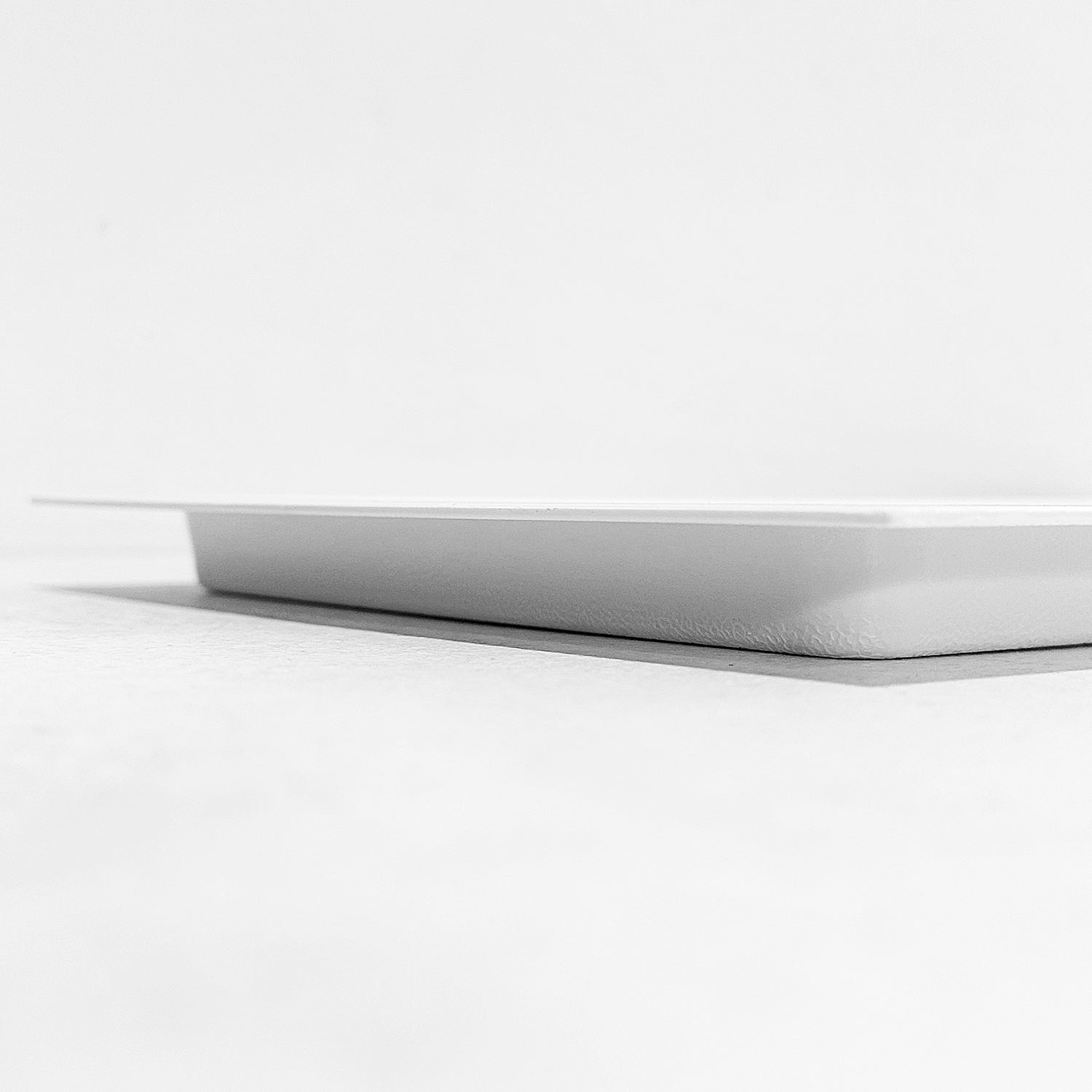 Side view of outward mounted vent cover (white)