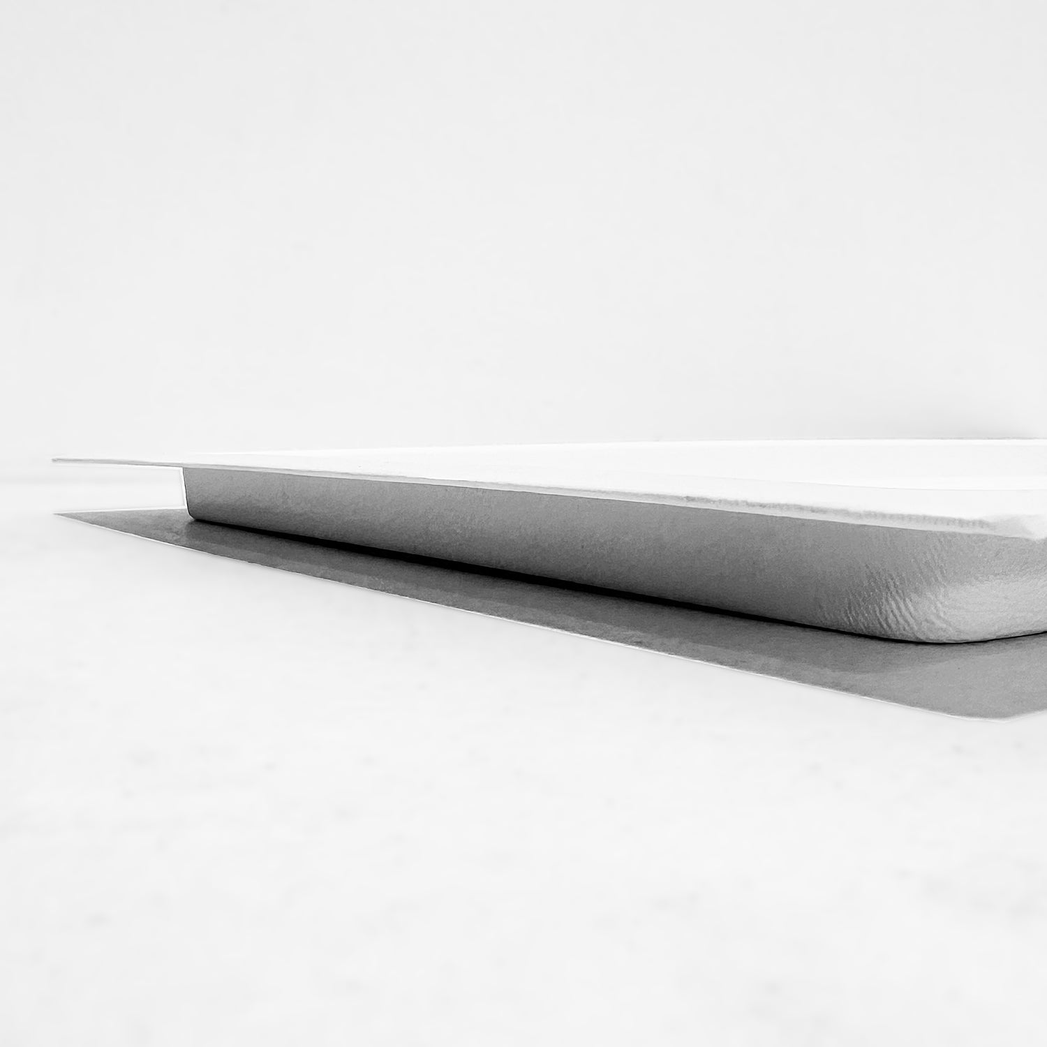 Side view of large outward mounted vent cover (white)