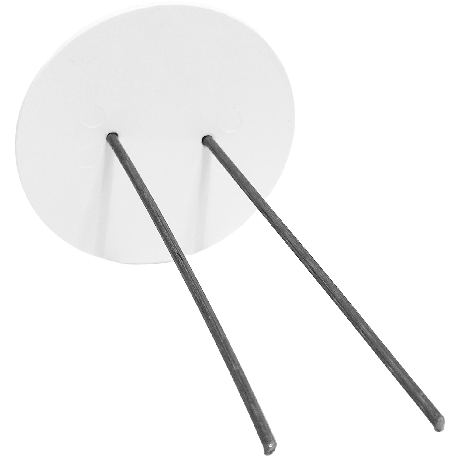 Back of white capped vapor barrier stakes