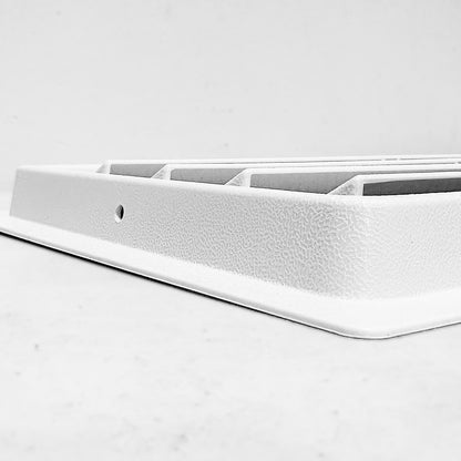 Side view of white air vent without cover